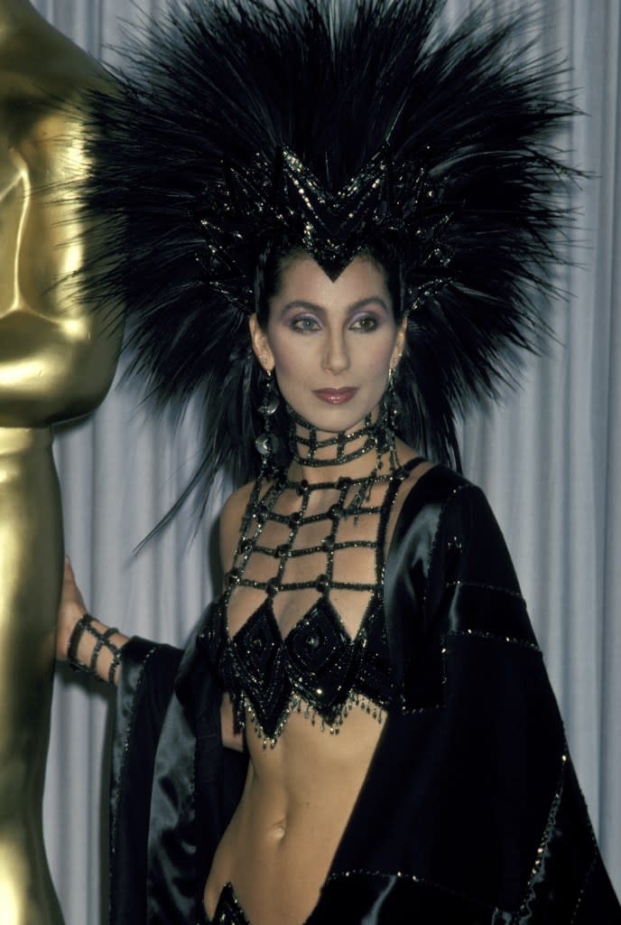 The songstress wore a jeweled bralette with a skirt and jacket, and feathered headdress. Ron Galella Collection via Getty Images