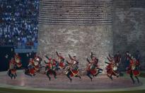 Actors perform during the closing ceremony of the 1st European Games in Baku, Azerbaijan, June 28 , 2015. REUTERS/Kai Pfaffenbach