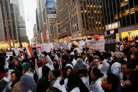 Demonstrators that include mostly medical students protest a proposed repeal of the Affordable Care Act in New York, U.S., January 30, 2017. REUTERS/Lucas Jackson