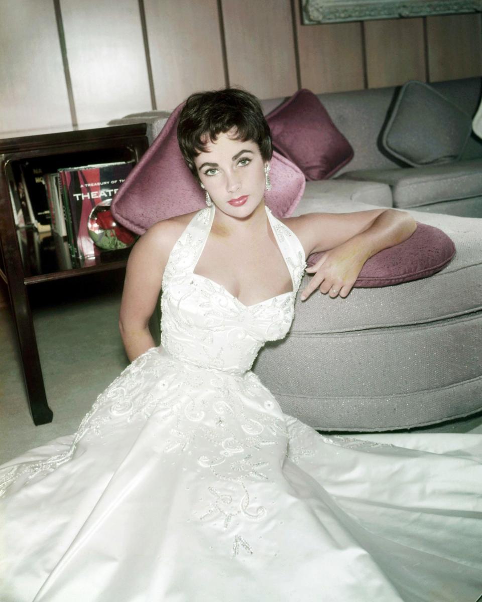 <p>From adorable child star to dazzling screen siren, Elizabeth Taylor built one of the most memorable careers in Hollywood history. However, between her many iconic films (<em>National Velvet, Who's Afraid of Virginia Wolfe, </em>and <em>Cleopatra</em>, to name a few) and tabloid-driven love life, there are few who saw the real Elizabeth. Now, eight years after her death, we take a look back on the icon's life in photos, including her <a href="https://www.goodhousekeeping.com/life/entertainment/g29232102/vintage-photos-of-hollywood-legends-wedding-day/" rel="nofollow noopener" target="_blank" data-ylk="slk:many weddings;elm:context_link;itc:0;sec:content-canvas" class="link ">many weddings</a>. (Don't forget to learn more about the lives of other Hollywood icons, like <a href="https://www.goodhousekeeping.com/life/entertainment/g28307872/rare-photos-of-judy-garland/" rel="nofollow noopener" target="_blank" data-ylk="slk:Judy Garland;elm:context_link;itc:0;sec:content-canvas" class="link ">Judy Garland</a> and <a href="https://www.goodhousekeeping.com/life/entertainment/g28378198/rare-photos-of-marilyn-monroe/" rel="nofollow noopener" target="_blank" data-ylk="slk:Marilyn Monroe;elm:context_link;itc:0;sec:content-canvas" class="link ">Marilyn Monroe</a>, too!)</p>