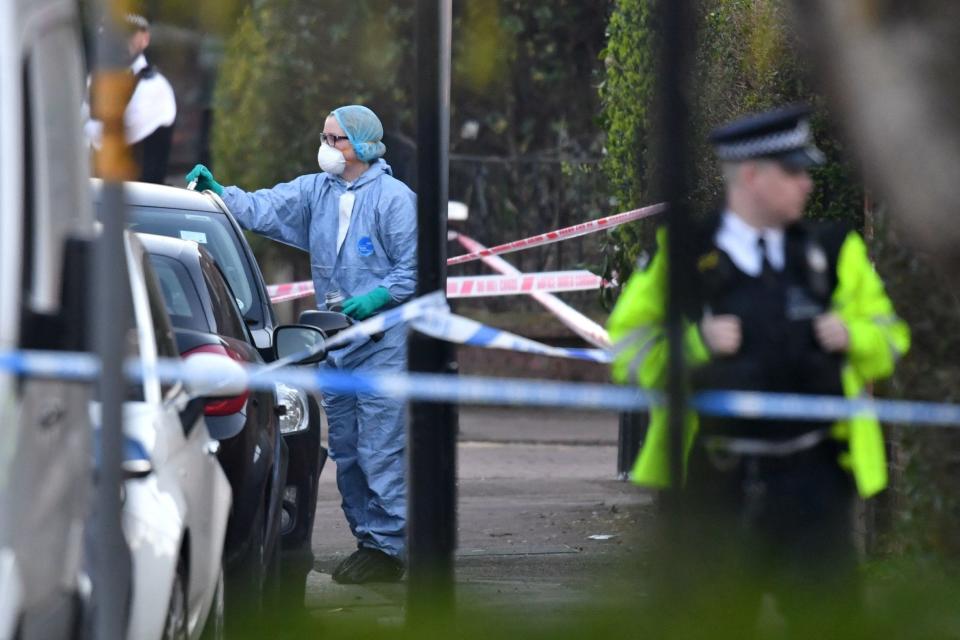 Police in Wood Green after the attack (PA)