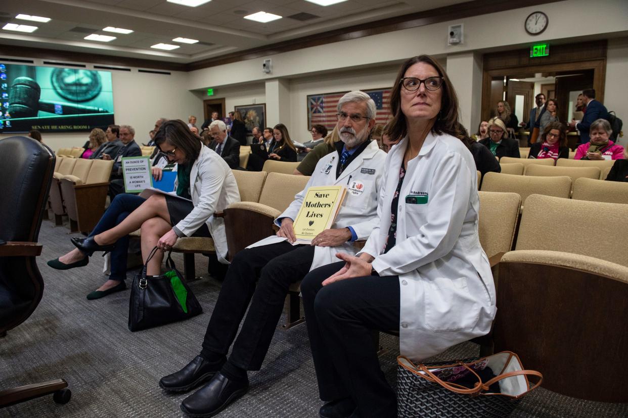 Dr. Howard Resenblum sits with Dr. Laura Andreson at Cordell Hull State Office Building before the Senate Judiciary Hearing in Nashville, Tenn., Monday, March 20, 2023.
