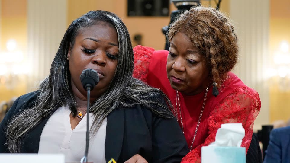 Wandrea "Shaye" Moss, a former Georgia election worker, is comforted by her mother, Ruby Freeman, right, as the House select committee investigating the Jan. 6 attack on the U.S. Capitol holds a hearing at the Capitol in Washington, DC, on June 21, 2022. - Jacquelyn Martin/AP