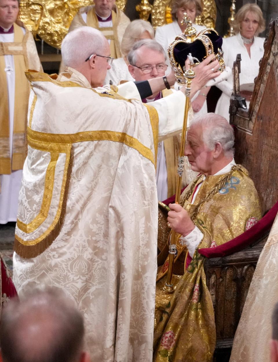 King Charles III is crowned with St. Edward's Crown by the Archbishop of Canterbury the Most Reverend Justin Welby during his coronation ceremony in Westminster Abbey on May 6 in London, England.