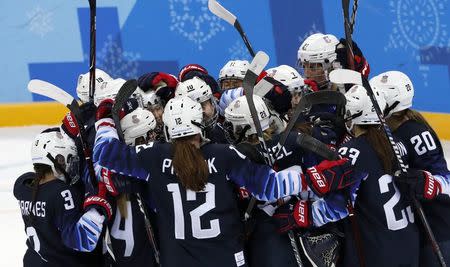 Ice Hockey - Pyeongchang 2018 Winter Olympics - Women's Semifinal Match - U.S. v Finland- Gangneung Hockey Centre, Gangneung, South Korea - February 19, 2018 - Team USA celebrate their win. REUTERS/Grigory Dukor