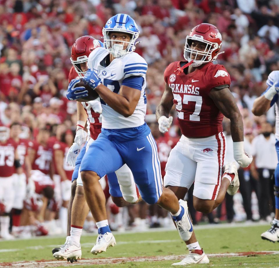 Brigham Young Cougars running back LJ Martin (27) scores a touchdown against the Arkansas Razorbacks at Razorback Stadium in Fayetteville on Saturday, Sept. 16, 2023. | Jeffrey D. Allred, Deseret News