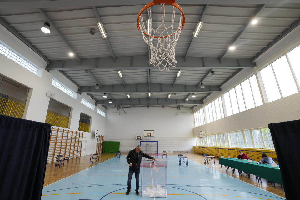 Polish voters take part in a local runoff election in Lomianki, near Warsaw, Poland on Sunday, April 21, 2024. Voters are choosing mayors who did not win outright in the first round of the election two weeks earlier. (AP Photo/Czarek Sokolowski)