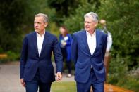 Federal Reserve Chair Jerome Powell and Governor of the Bank of England, Mark Carney are seen during the three-day "Challenges for Monetary Policy" conference in Jackson Hole, Wyoming