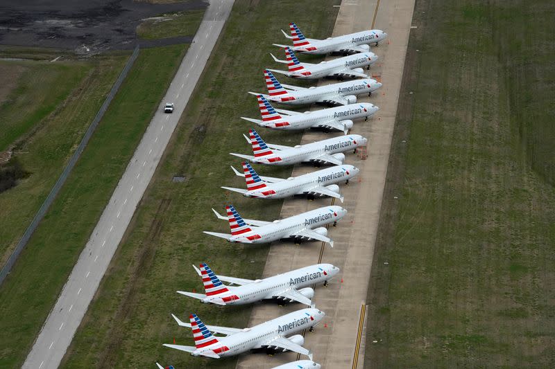 American Airlines 737 Max passenger planes are parked on the tarmac at Tulsa International Airport in Tulsa