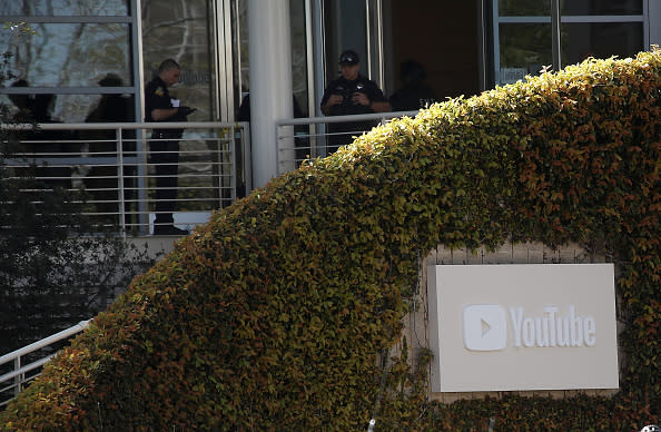 Police officers stand by in front of the YouTube headquarters on April 3, 2018 in San Bruno, Calif. Police are investigating an active shooter incident at YouTube headquarters that left at least one person dead and several wounded. (Photo by Justin Sullivan/Getty Images)