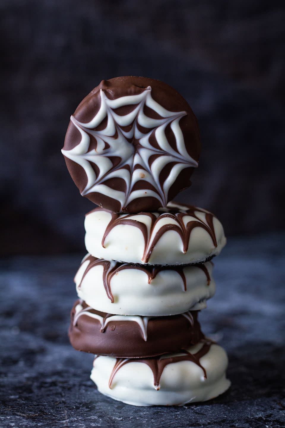 <p>Give your Oreos a spooky spin this Halloween with this super-easy (and super-genius) spider web design.</p><p>Get the recipe from <a href="https://www.delish.com/cooking/recipe-ideas/recipes/a43945/oreo-spider-webs-recipe/" rel="nofollow noopener" target="_blank" data-ylk="slk:Delish;elm:context_link;itc:0;sec:content-canvas" class="link ">Delish</a>.</p>