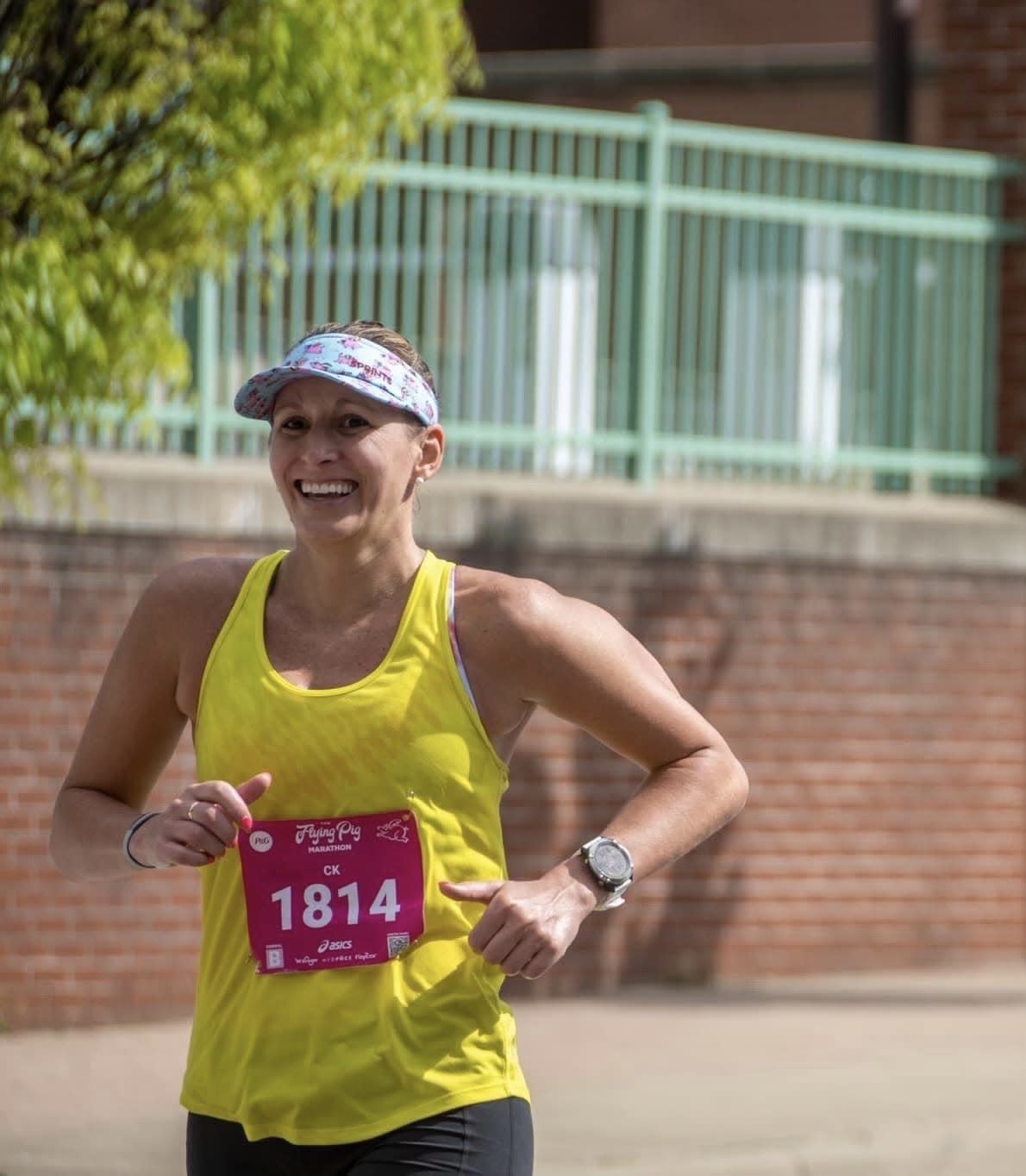 Caroline Keating is a 23-time marathon finisher. Keating is a St. Ursula Academy graduate who was an All-American swimmer at Bowling Green.