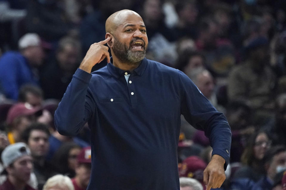 Cleveland Cavaliers head coach J.B Bickerstaff yells instructions to players in the first half of an NBA basketball game against the Houston Rockets, Wednesday, Dec. 15, 2021, in Cleveland. The Cavaliers won 124-89. (AP Photo/Tony Dejak)