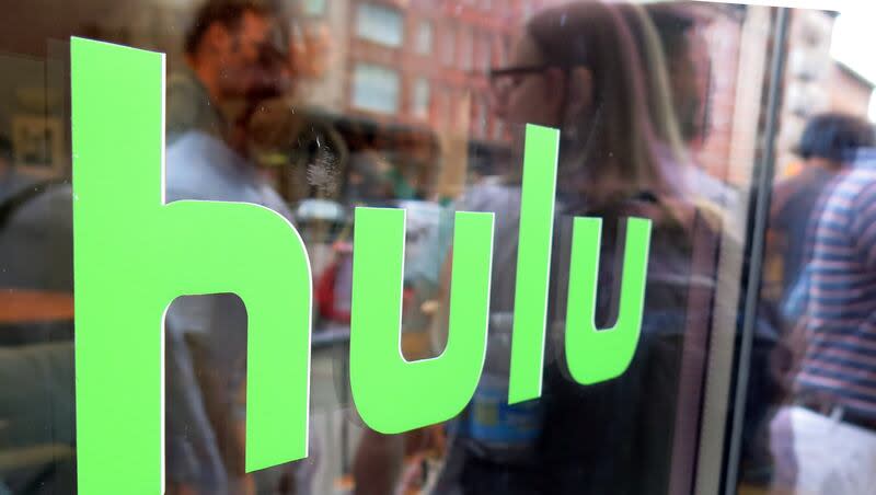 This Saturday, June 27, 2015 photo shows the Hulu logo on a window at the Milk Studios space in New York, where a replica of the "Seinfeld" set was on display.