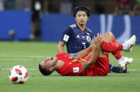 <p>Belgium’s Eden Hazard goes down after a challenge by Japan’s Gaku Shibasaki REUTERS/Marko Djurica </p>