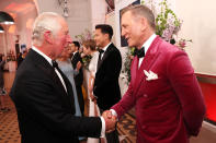 <p>His father, Prince Charles, shook Craig's hand before the film's premiere. </p>