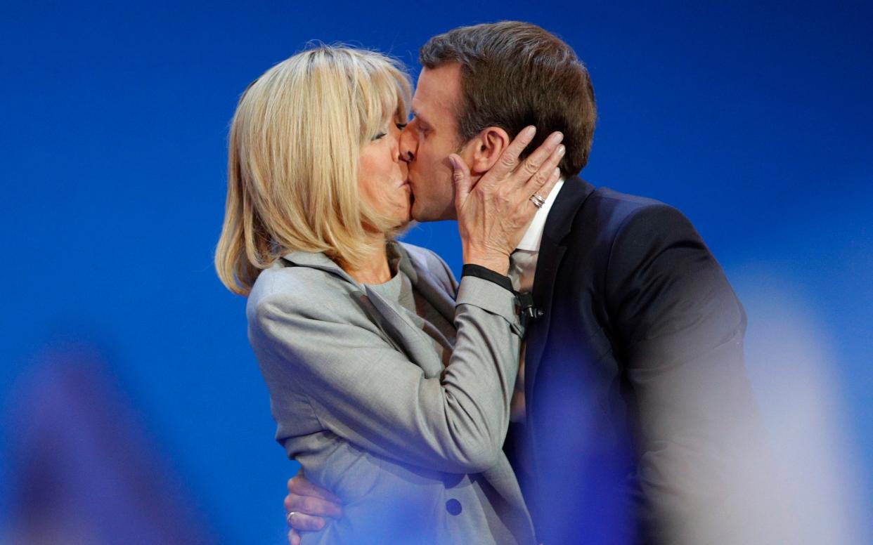Emmanuel Macron kisses his wife on the day he was elected in 2017