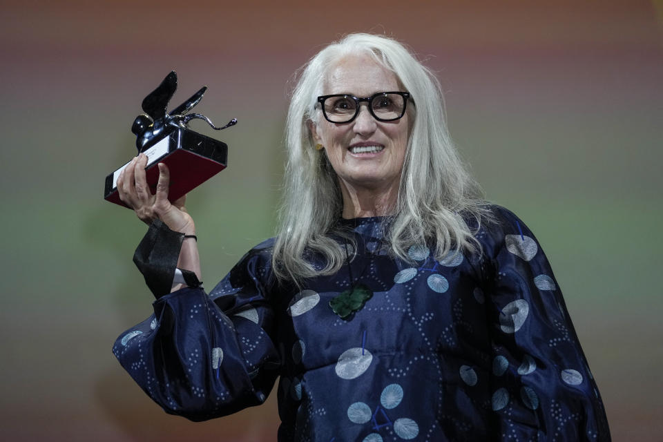 Jane Campion holds the Silver Lion Best Director award for 'The Power Of The Dog' onstage at the closing ceremony during the 78th edition of the Venice Film Festival in Venice, Italy, Saturday, Sept. 11, 2021. (AP Photo/Domenico Stinellis)