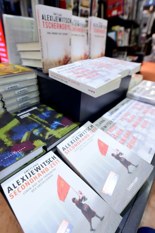 Books written by Belarus journalist and writer Svetlana Alexievich are on display at a bookshop in Berlin on October 8, 2015 after she won the 2015 Nobel Literature Prize