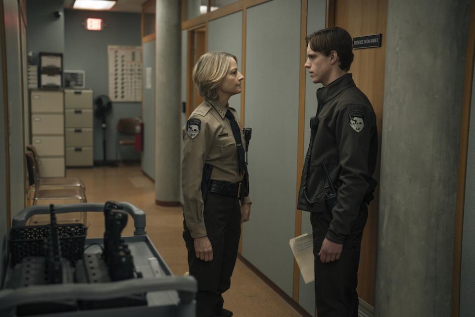Jodie Foster and Finn Bennett stand in the police station in True Detective Season 4 Episode 5, "Night Country"