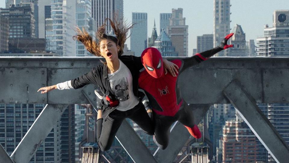 Spider-Man and MJ leap off a building together in Spider-Man: No Way Home