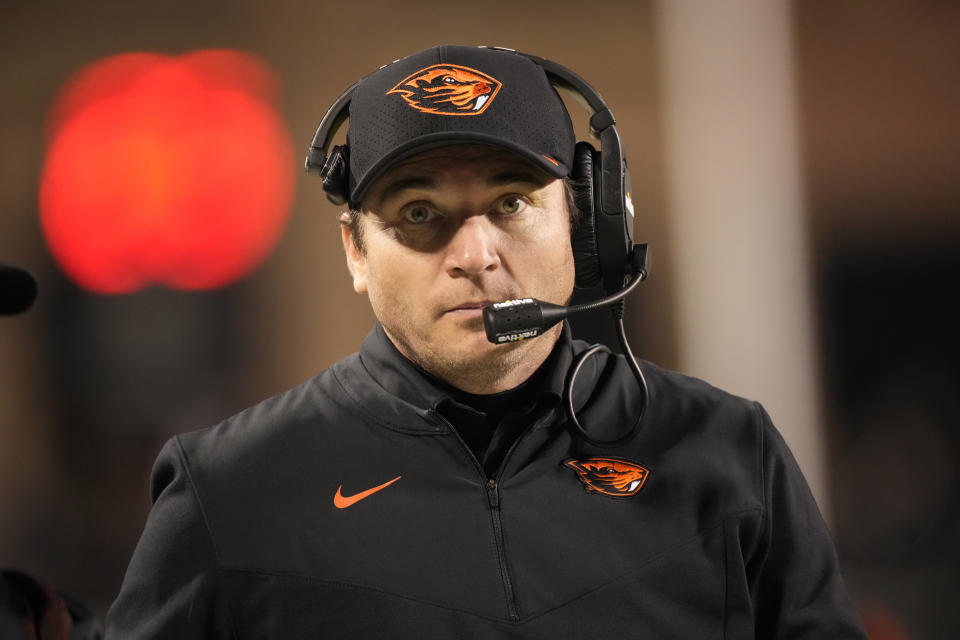 Oregon State head coach Jonathan Smith looks on in the second half of an NCAA college football game against Colorado, Saturday, Nov. 6, 2021, in Boulder, Colo. (AP Photo/David Zalubowski)