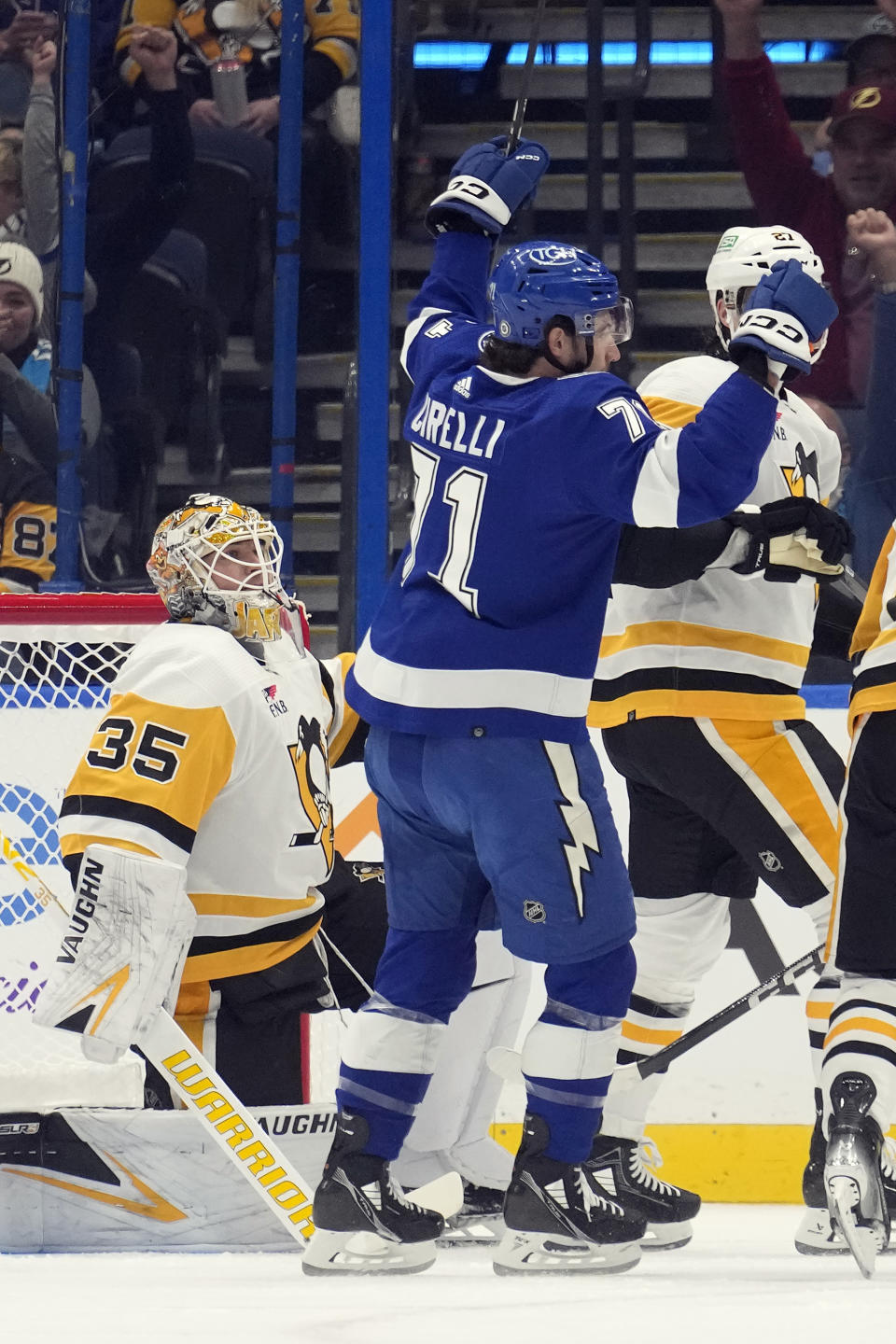 Tampa Bay Lightning center Anthony Cirelli (71) celebrates after scoring past Pittsburgh Penguins goaltender Tristan Jarry (35) during the first period of an NHL hockey game Wednesday, Dec. 6, 2023, in Tampa, Fla. (AP Photo/Chris O'Meara)
