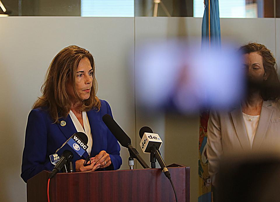 Delaware Attorney General Kathleen Jennings (left) speaks at a press conference on Thursday October 26, 2023 in Wilmington announcing a lawsuit against several chemical companies.