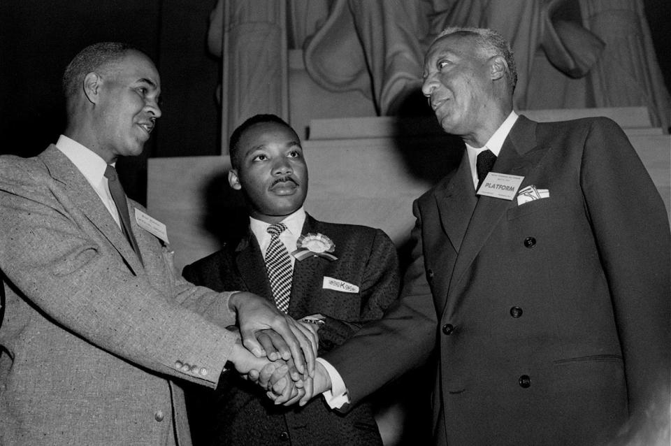 <p>Pictured left to right at the Freedom Pilgrimage rally at the Lincoln Memorial, Washington, D.C., May 17, 1957, are: Roy Wilkins of New York, executive secretary of the NAACP; the Rev. Martin Luther King, Jr. of Montgomery, Ala.; and A. Philip Randolph of New York, president of the Brotherhood of Sleeping Car Porters. (AP Photo/Charles Gorry) </p>