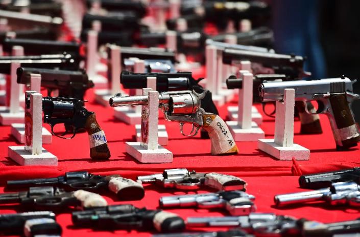 View of weapons seized by the police and others voluntarily handed over by citizens, before being destroyed by the National Service of Disarmament in Caracas, on September 8, 2016 (AFP Photo/Ronaldo Schemidt)