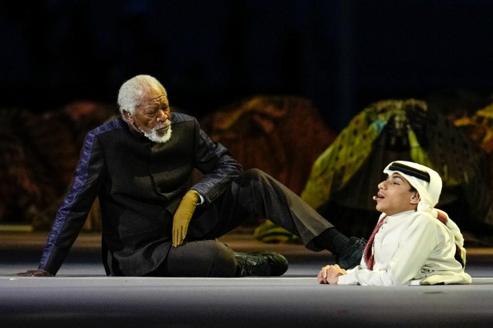 Morgan Freeman and Qatari YouTuber Ghanim al Muftah (AP)