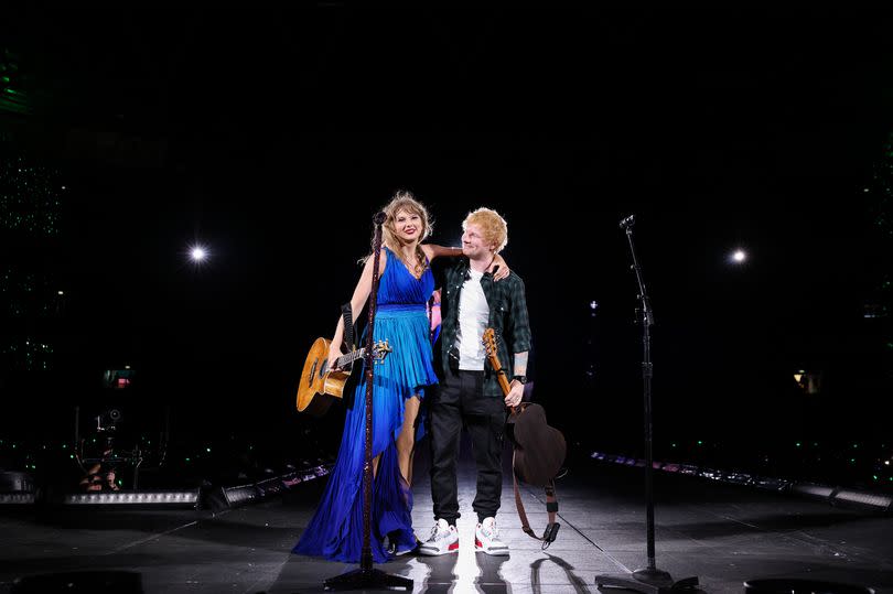 Taylor Swift and Ed Sheeran perform onstage during "Taylor Swift | The Eras Tour" at Wembley Stadium