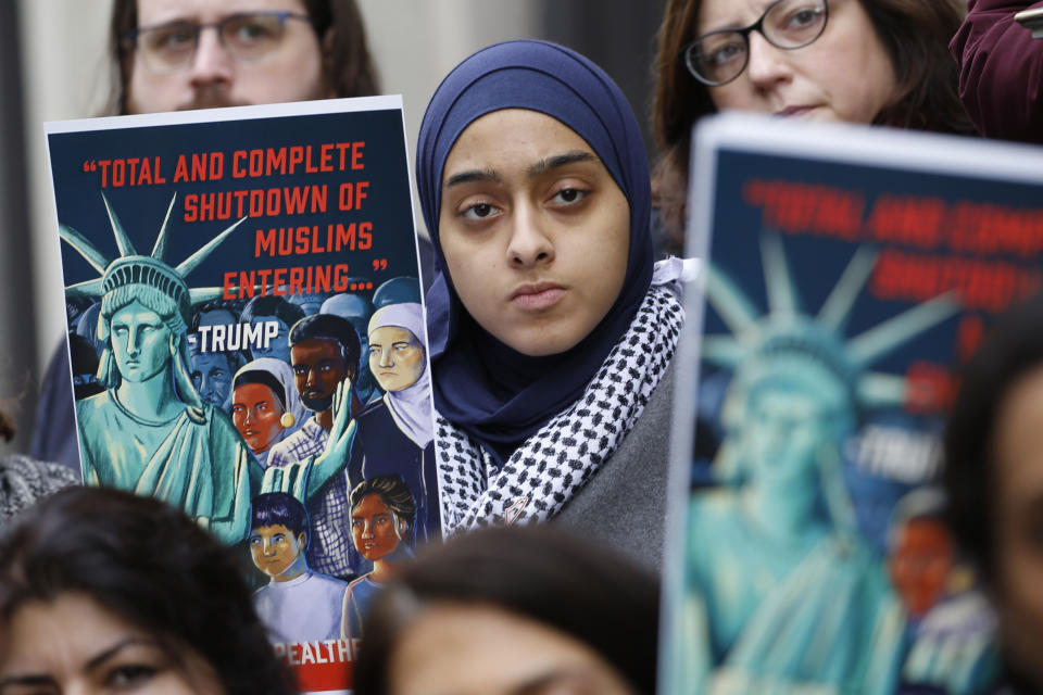Demonstrators rally outside the U.S. Court of Appeals for the 4th Circuit on Jan. 28, 2020, in Richmond, Virginia, where arguments over President Donald Trump's travel ban were being heard. (Photo: ASSOCIATED PRESS)