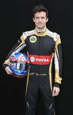 Lotus Formula One driver Jolyon Palmer of Britain poses during a photo session before the Australia Formula One Grand Prix, at Melbourne's Albert Park Track, March 12, 2015. REUTERS/Brandon Malone