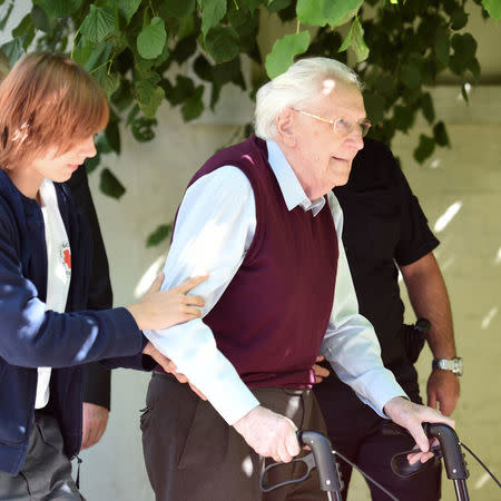 FILE PHOTO - Oskar Groening, defendant and former Nazi SS officer dubbed the "bookkeeper of Auschwitz" leaves the court after the announcement of his verdict in Lueneburg, Germany, July 15, 2015. REUTERS/Fabian Bimmer/File photo