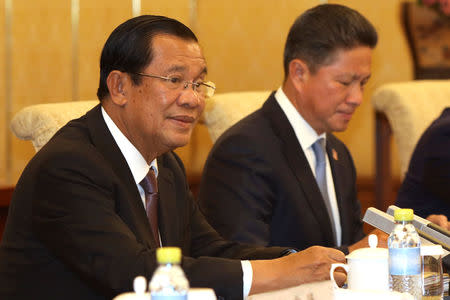 Cambodian Prime Minister Hun Sen speaks during a meeting with Chinese President Xi Jinping at the Diaoyutai state guesthouse in Beijing, China, January 21, 2019. Ng Han Guan/Pool via REUTERS