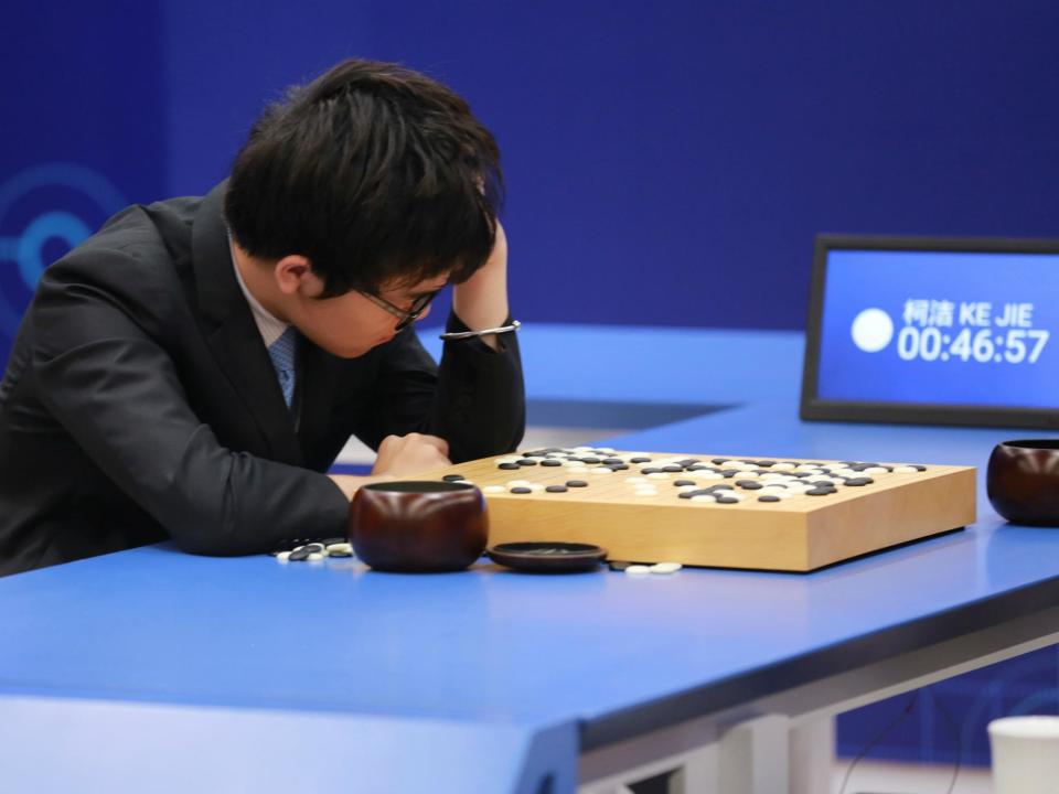 Chinese Go player Ke Jie reacts during his second match against Google's artificial intelligence program AlphaGo at the Future of Go Summit in Wuzhen, Zhejiang province, China May 25, 2017: REUTERS/Stringer