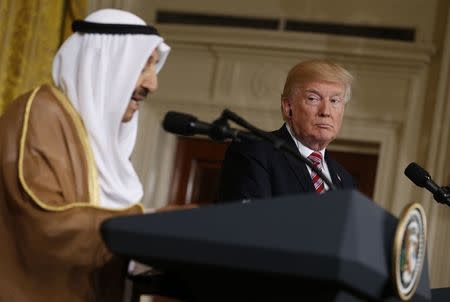 U.S. President Donald Trump (R) listens during a joint news conference with Emir of Kuwait Sabah Al-Ahmad Al-Jaber Al-Sabah in the East Room of the White House in Washington, U.S., September 7, 2017. REUTERS/Jonathan Ernst