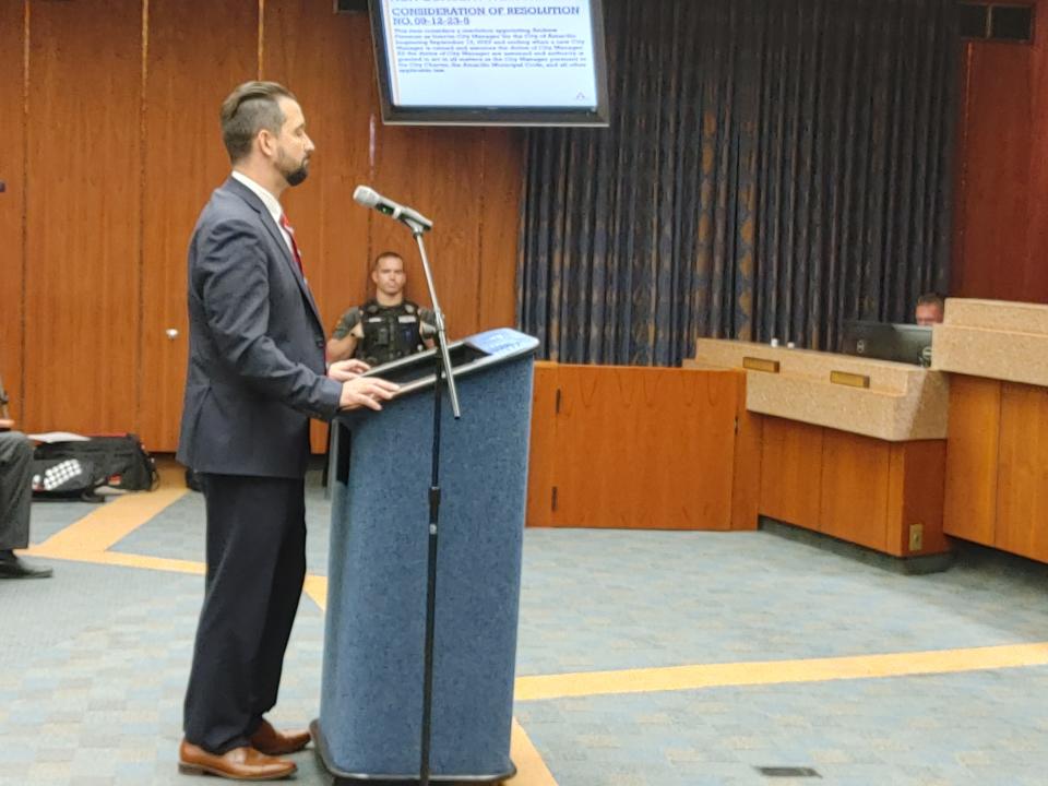 Newly appointed interim city manager Andrew Freeman addresses city council Tuesday at city hall.