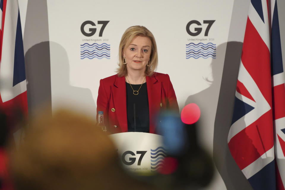 Britain's Foreign Secretary Liz Truss speaks at a press conference at the G7 Foreign Ministers meeting in Liverpool, England Sunday, Dec. 12, 2021. Foreign Secretary Liz Truss is hosting U.S. Secretary of State Antony Blinken and other Group of Seven counterparts for weekend talks in the northwest England port city of Liverpool as the wealthy nations club faces growing tensions with Russia, China and Iran. (AP Photo/Jon Super)