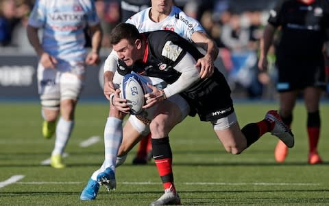 Ben Spencer of Saracens is tackled by Juan Imhoff of Racing 92 during the Heineken Champions Cup Round 6 match between Saracens and Racing 92 at Allianz Park on January 19, 2020 in Barnet, England - Credit: Getty Images