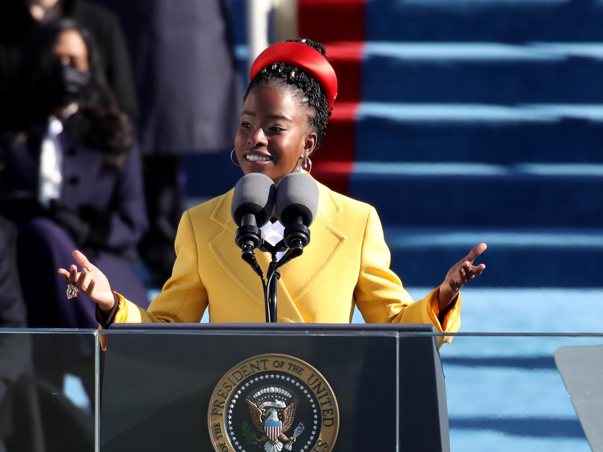 Amanda Gorman reads during Joe Biden’s inauguration at the US Capitol on 20 January 2021 (Rob Carr/Getty Images)