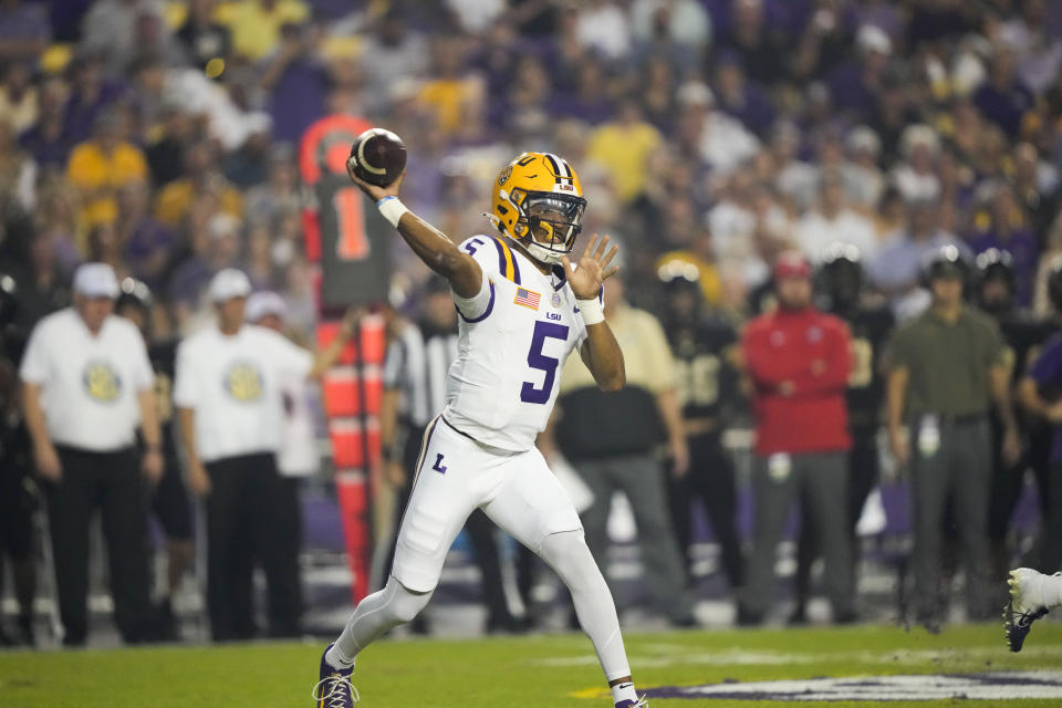 LSU quarterback Jayden Daniels could put himself at the forefront of the Heisman race if he can lead the Tigers to win at Alabama this weekend. (AP Photo/Gerald Herbert)