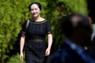 FILE PHOTO: Huawei Technologies Chief Financial Officer Meng Wanzhou leaves her home to attend a court hearing in Vancouver