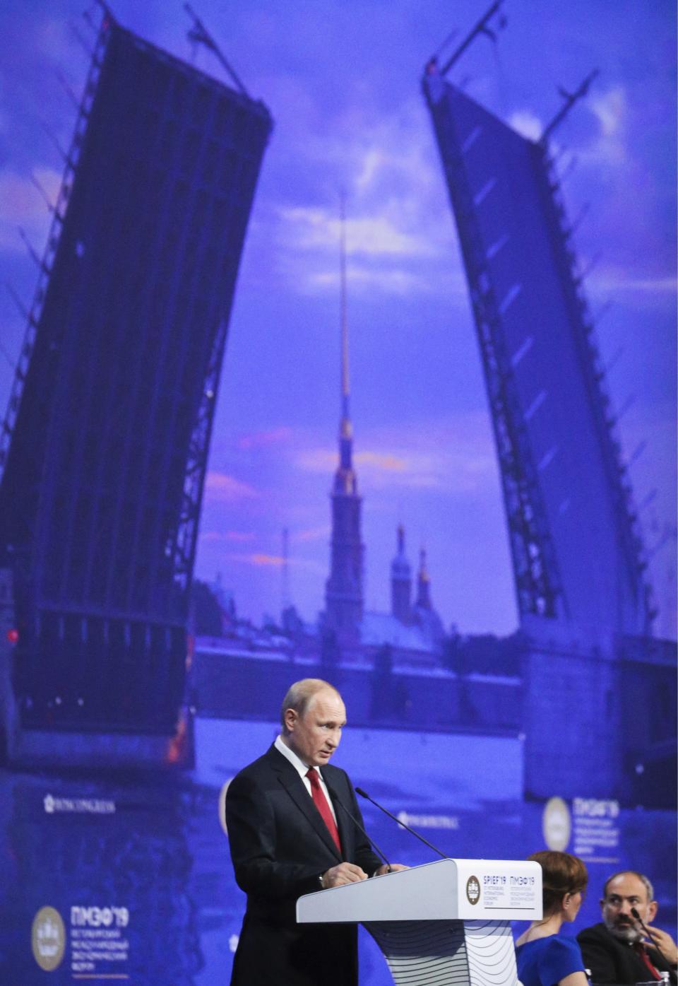 Russian President Vladimir Putin addresses the St. Petersburg International Economic Forum in St. Petersburg, Russia, Friday, June 7, 2019. (Sergei Bobylev/TASS News Agency Pool Photo via AP)