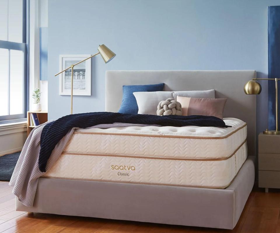 A Saatva Classic mattress in a modern bedroom