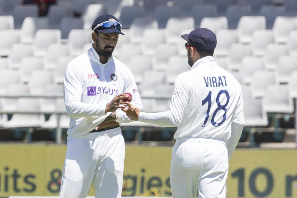 India captain Virat Kohli and Kannur Rahul chat between balls during the second day of the third and final test match between South Africa and India in Cape Town, South Africa, Wednesday, Jan. 12, 2022. (AP Photo/Halden Krog)