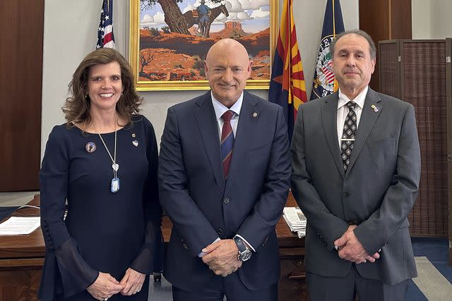 <p>Courtesy Teri Caserta</p> Teri and Patrick Caserta meeting with bill cosponsor Arizona Sen. Mark Kelly in March.