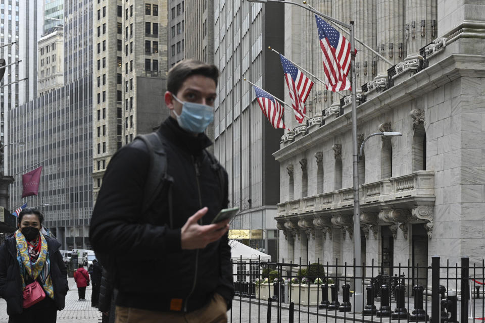 Photo by: NDZ/STAR MAX/IPx 2022 1/24/22 People walk past the New York Stock Exchange (NYSE) on Wall Street on January 24, 2022 in New York.