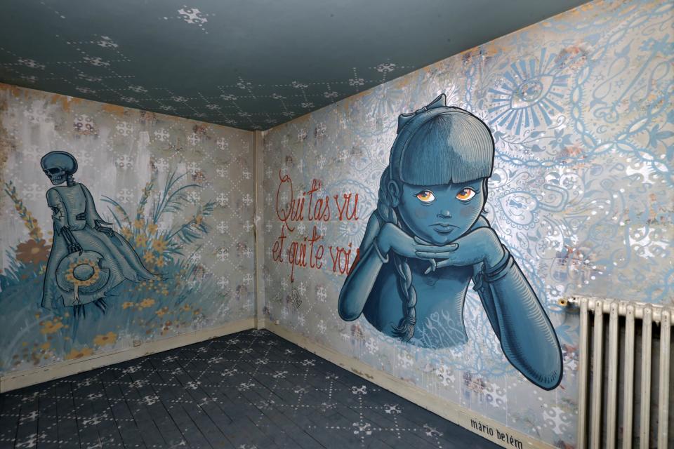 A bedroom painted by Portuguese street artist Mario Belem is seen at the street art project tower "Paris Tour 13" in Paris